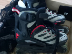 Роликовые коньки